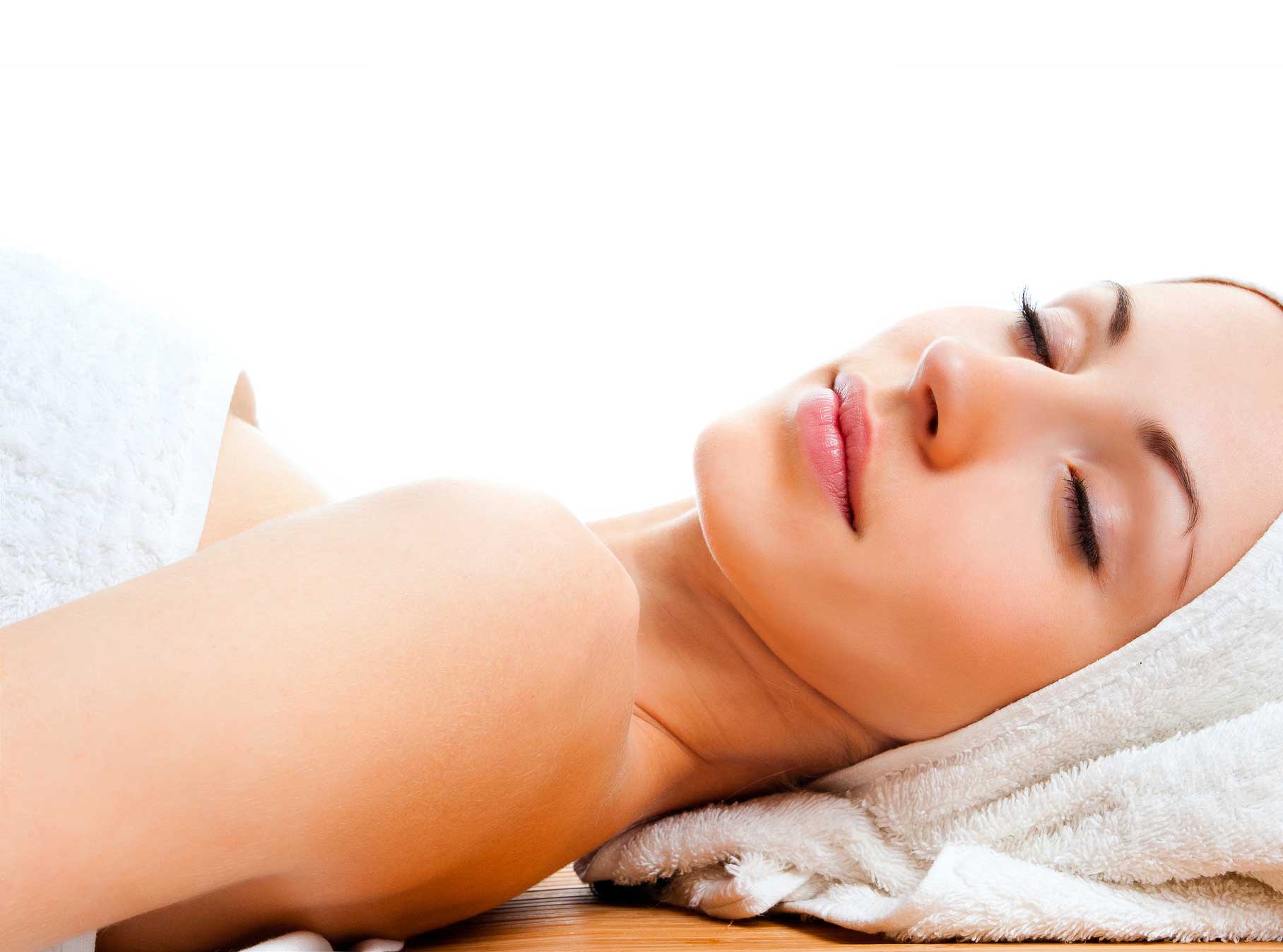 Woman Relaxing with Towel on Head
